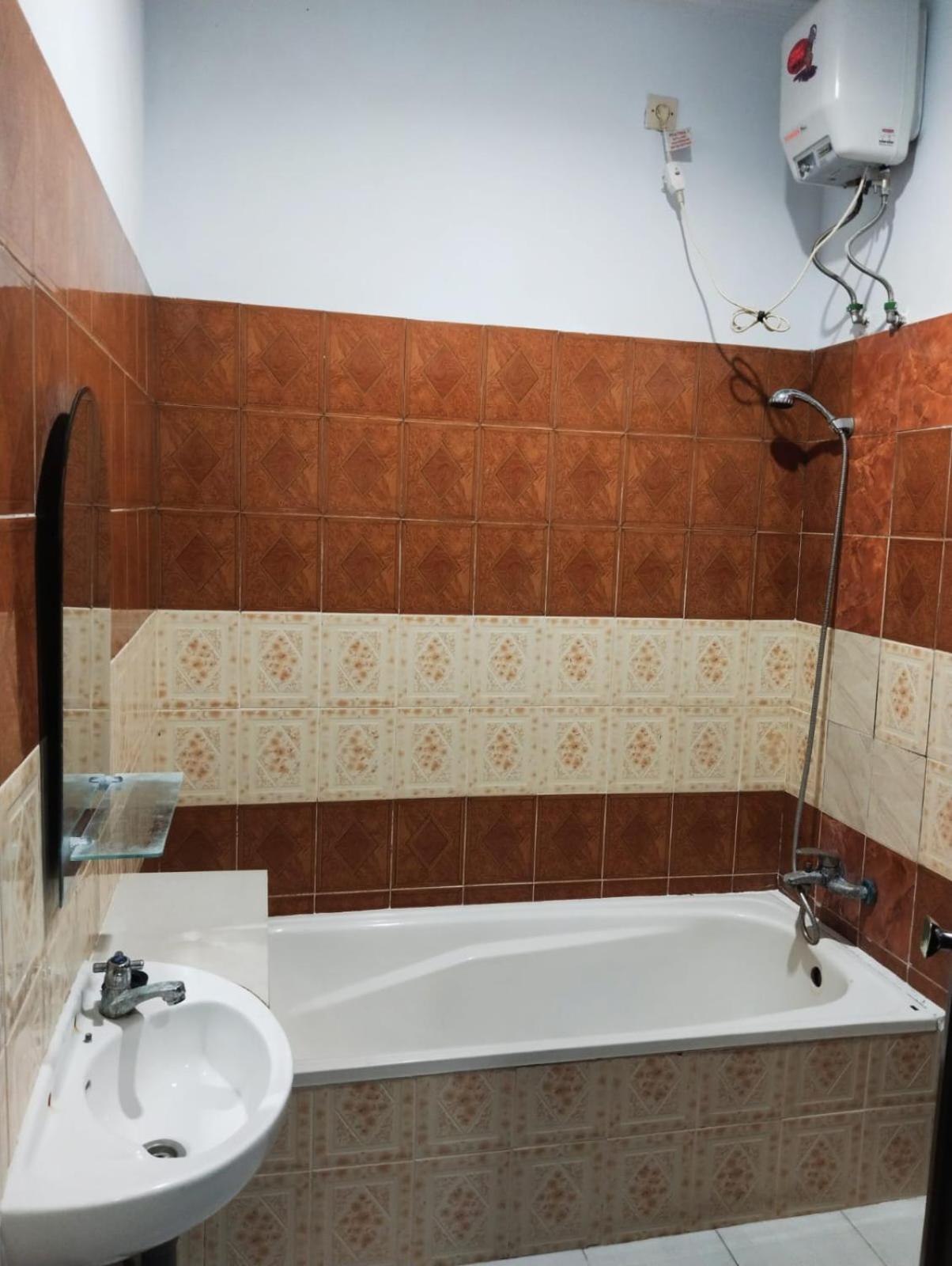 Hotel Lestari Гилиманук Экстерьер фото